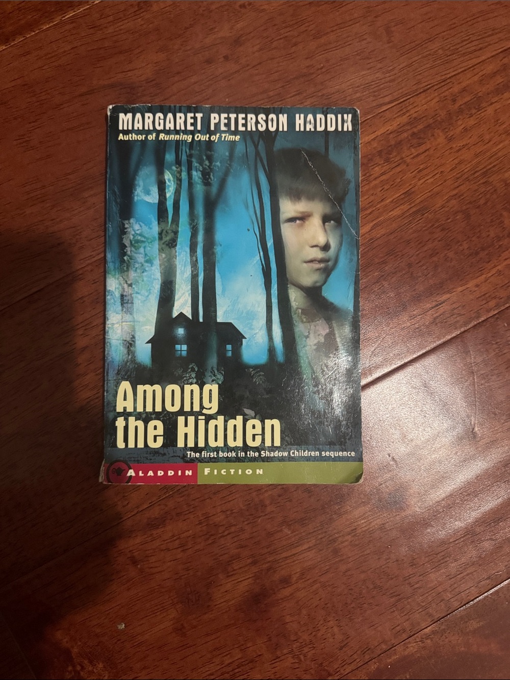 Among the Hidden by — Blue Cover Paperback